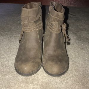 These are some kids heel boots.